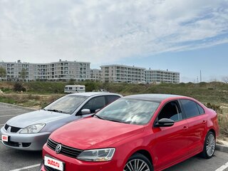 2012 Volkswagen Jetta VI, красный, 1250000 рублей, вид 1