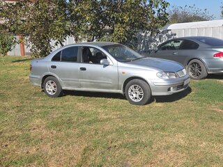 2002 Nissan Sunny N16, серебристый, 250000 рублей, вид 3