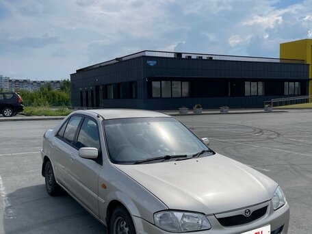 2000 Ford Laser IV, золотистый, 200000 рублей, вид 3