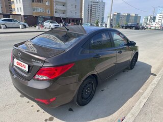 2015 Hyundai Solaris I Рестайлинг, коричневый, 550000 рублей, вид 3