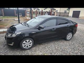 2012 Kia Rio III, чёрный, 640000 рублей, вид 1