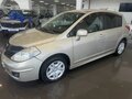 2010 Nissan Tiida I Рестайлинг, серебристый