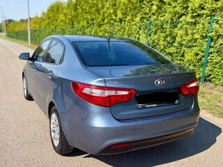 2013 Kia Rio 5-speed III, голубой, 709000 рублей, вид 5