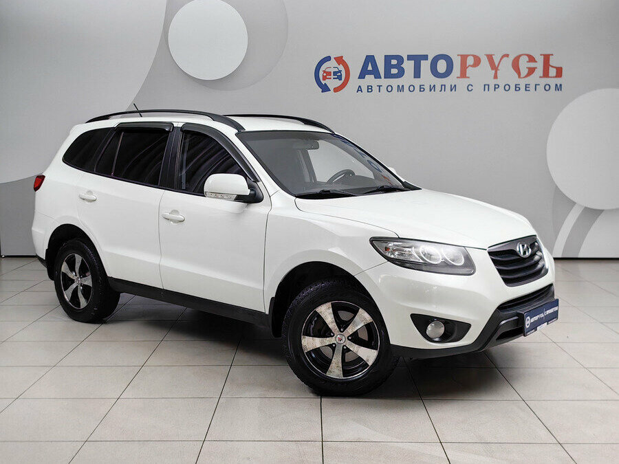 Открыть фотографии: Hyundai Santa Fe II Рестайлинг