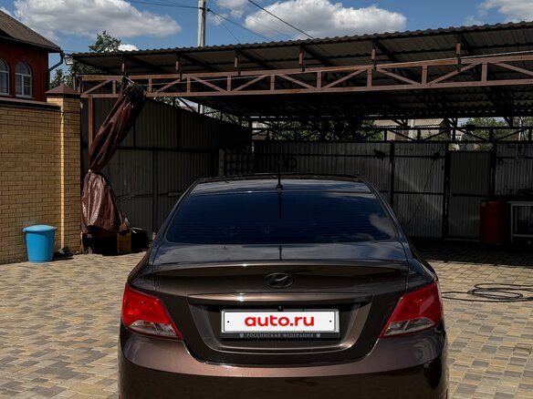 2014 Hyundai Solaris I Рестайлинг, коричневый, 849000 рублей - вид 2