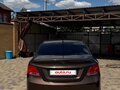 2014 Hyundai Solaris I Рестайлинг, коричневый, 849000 рублей - вид 2