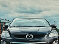 2010 Mazda CX-7 I Рестайлинг, чёрный, 820000 рублей - вид 4