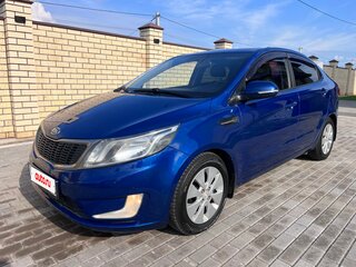 2012 Kia Rio 4-speed III, синий, 697000 рублей, вид 1
