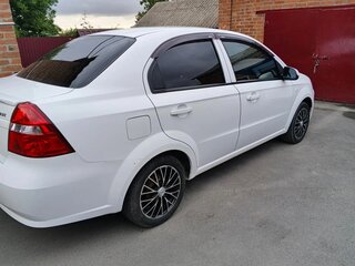 2011 Chevrolet Aveo I Рестайлинг, белый, 555000 рублей, вид 3
