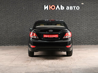 2011 Hyundai Solaris I, чёрный, 675000 рублей, вид 5