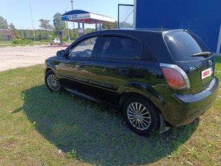 2011 Kia Rio II Рестайлинг, чёрный, 510000 рублей, вид 5
