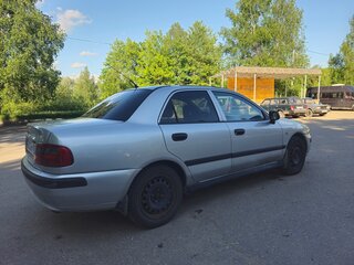 2003 Mitsubishi Carisma I Рестайлинг, серебристый, 385000 рублей, вид 3