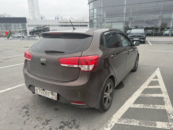 2015 Kia Rio III Рестайлинг, коричневый - вид 3