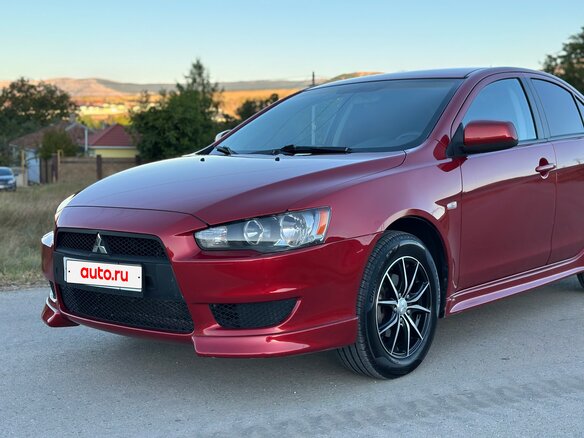 2007 Mitsubishi Lancer X, красный - вид 5