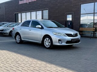 2010 Toyota Corolla X (E140, E150) Рестайлинг, серебристый, 949990 рублей, вид 1