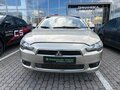 2007 Mitsubishi Lancer X, бежевый, 472000 рублей - вид 1