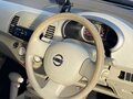 2005 Nissan March III (K12), красный - вид 2