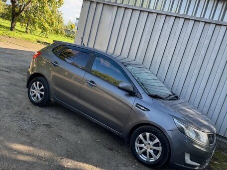 2013 Kia Rio 5-speed III, серый, 784000 рублей, вид 5