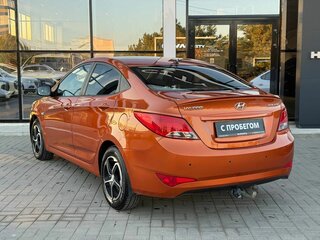 2014 Hyundai Solaris I, оранжевый, 850000 рублей, вид 3