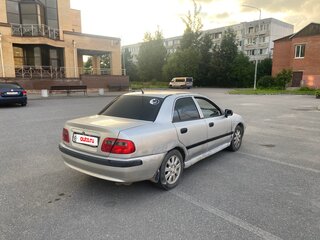 2003 Mitsubishi Carisma I Рестайлинг, серебристый, 150000 рублей, вид 4