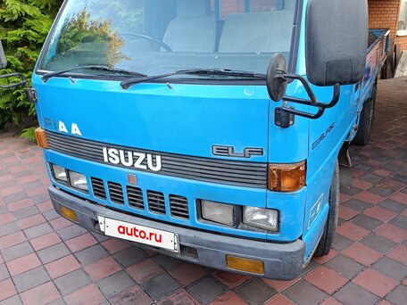 1989 Isuzu Elf (N-series), голубой, 720000 рублей, вид 1