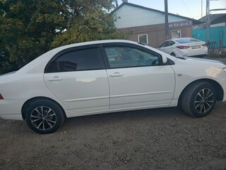 2005 Toyota Corolla IX (E120, E130) Рестайлинг, белый, 650000 рублей, вид 2