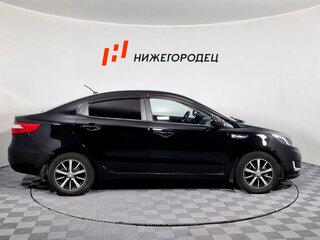 2011 Kia Rio 5-speed III, чёрный, 601000 рублей, вид 4