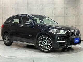 2017 BMW X1 18i sDrive II (F48), чёрный, 1390005 рублей, вид 2