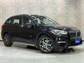 2017 BMW X1 18i sDrive II (F48), чёрный, 1390005 рублей - вид 1