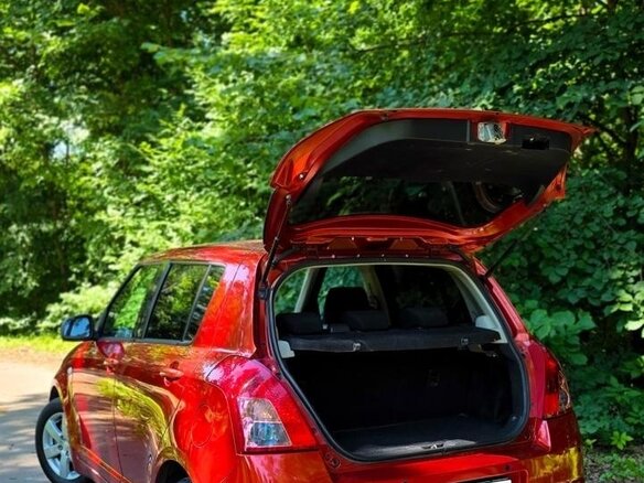 2010 Suzuki Swift III, оранжевый, 720000 рублей - вид 8