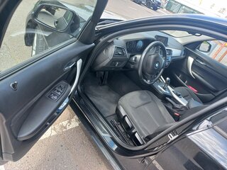 2018 BMW 1 серии 118i II (F20/F21) Рестайлинг 2, чёрный, 1900000 рублей, вид 2