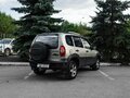 2010 Chevrolet Niva I Рестайлинг, серебристый, 444000 рублей - вид 3