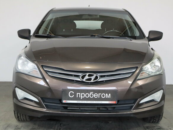 2015 Hyundai Solaris I Рестайлинг, коричневый - вид 1