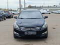 2014 Hyundai Solaris I Рестайлинг, чёрный, 820000 рублей - вид 1