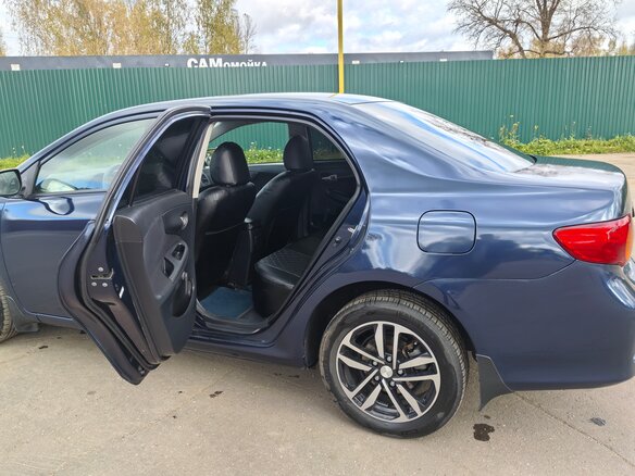2009 Toyota Corolla X (E140, E150), синий, 650000 рублей - вид 5