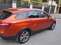 2017 Lada (ВАЗ) Vesta SW Cross I, оранжевый, 950000 рублей - вид 1