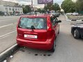 2008 Nissan Note I, пурпурный, 699000 рублей - вид 3