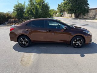 2016 Toyota Corolla XI (E160, E170, E180) Рестайлинг 1, коричневый, 1399999 рублей, вид 3