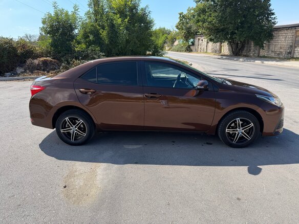 2016 Toyota Corolla XI (E160, E170, E180) Рестайлинг 1, коричневый, 1399999 рублей - вид 2