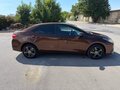 2016 Toyota Corolla XI (E160, E170, E180) Рестайлинг 1, коричневый, 1399999 рублей - вид 2