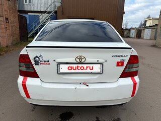 2003 Toyota Corolla IX (E120, E130), белый, 300002 рублей, вид 5