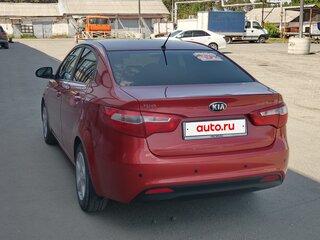 2014 Kia Rio 6-speed III, красный, 698000 рублей, вид 5