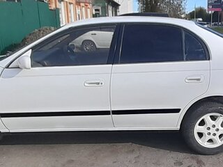 1995 Toyota Corolla VIII (E110), белый, 370000 рублей, вид 4
