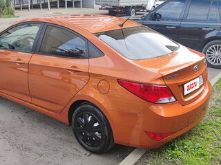 2015 Hyundai Solaris I Рестайлинг, оранжевый, 880000 рублей, вид 3