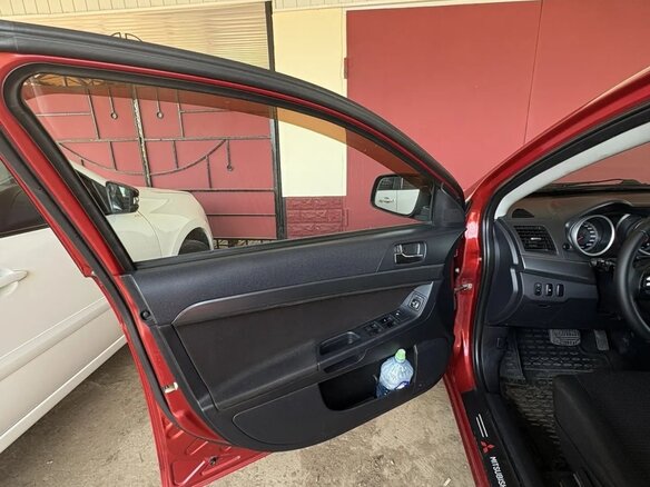 2008 Mitsubishi Lancer X, красный, 600000 рублей - вид 12