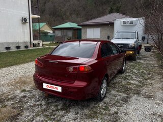 2008 Mitsubishi Lancer X, красный, 550000 рублей, вид 2