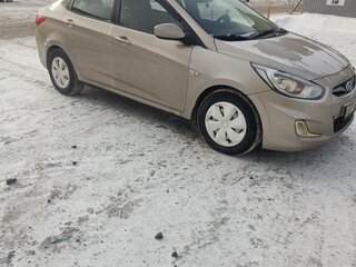 2011 Hyundai Solaris I, золотистый, 650000 рублей, вид 3