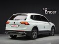 2023 Volkswagen Tiguan II Рестайлинг, белый - вид 2