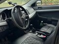 2010 Mitsubishi Lancer X, чёрный, 550000 рублей - вид 5