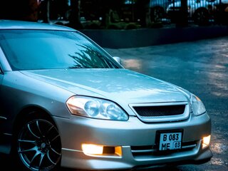 2001 Toyota Mark II IX (X110), серый, 825000 рублей, вид 4